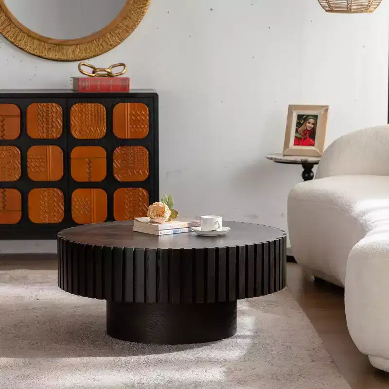 Round Coffee Table with Handcrafted Olive-Shaped Relief and Sturdy Pedestal Base