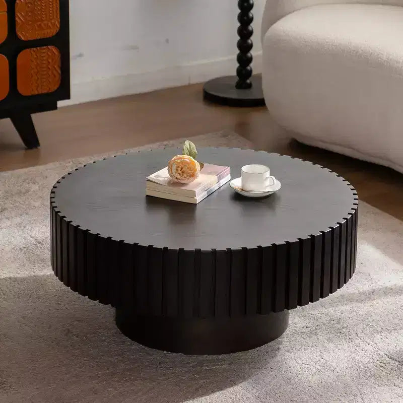 Round Coffee Table with Handcrafted Olive-Shaped Relief and Sturdy Pedestal Base