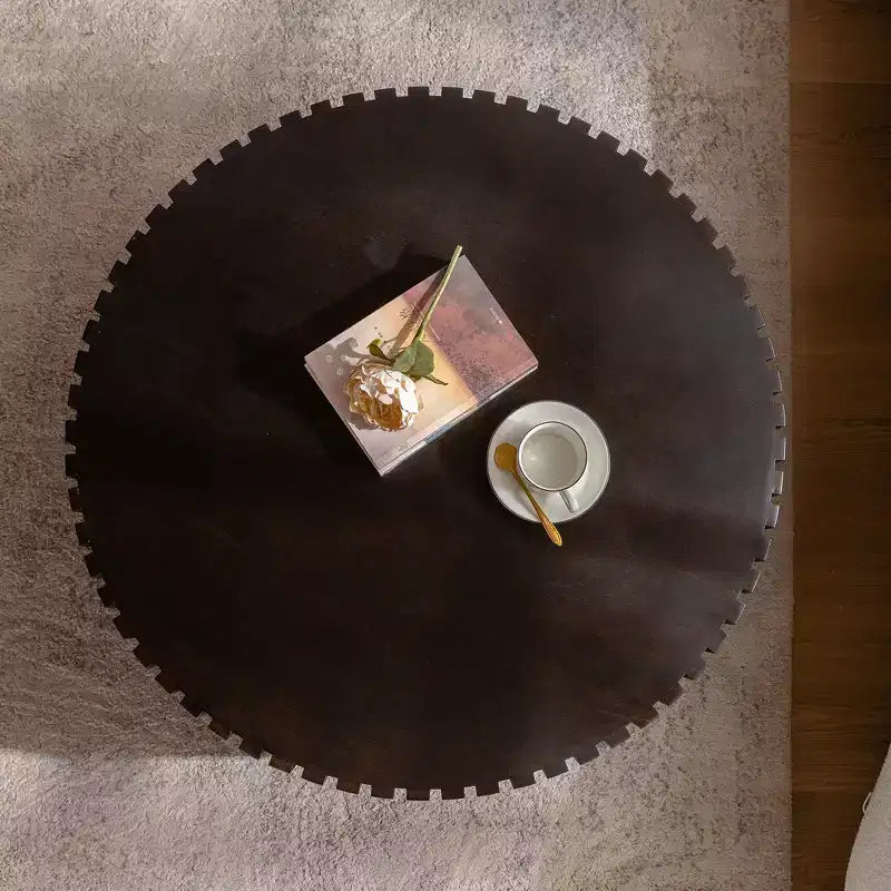 Round Coffee Table with Handcrafted Olive-Shaped Relief and Sturdy Pedestal Base